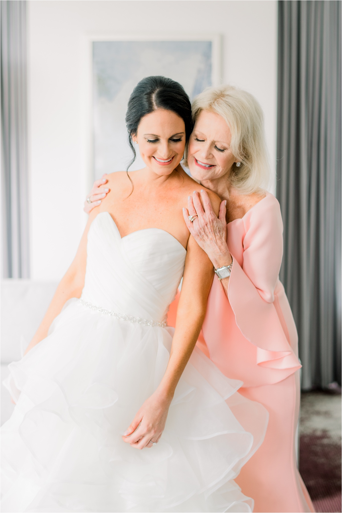 bride with mom on her wedding day