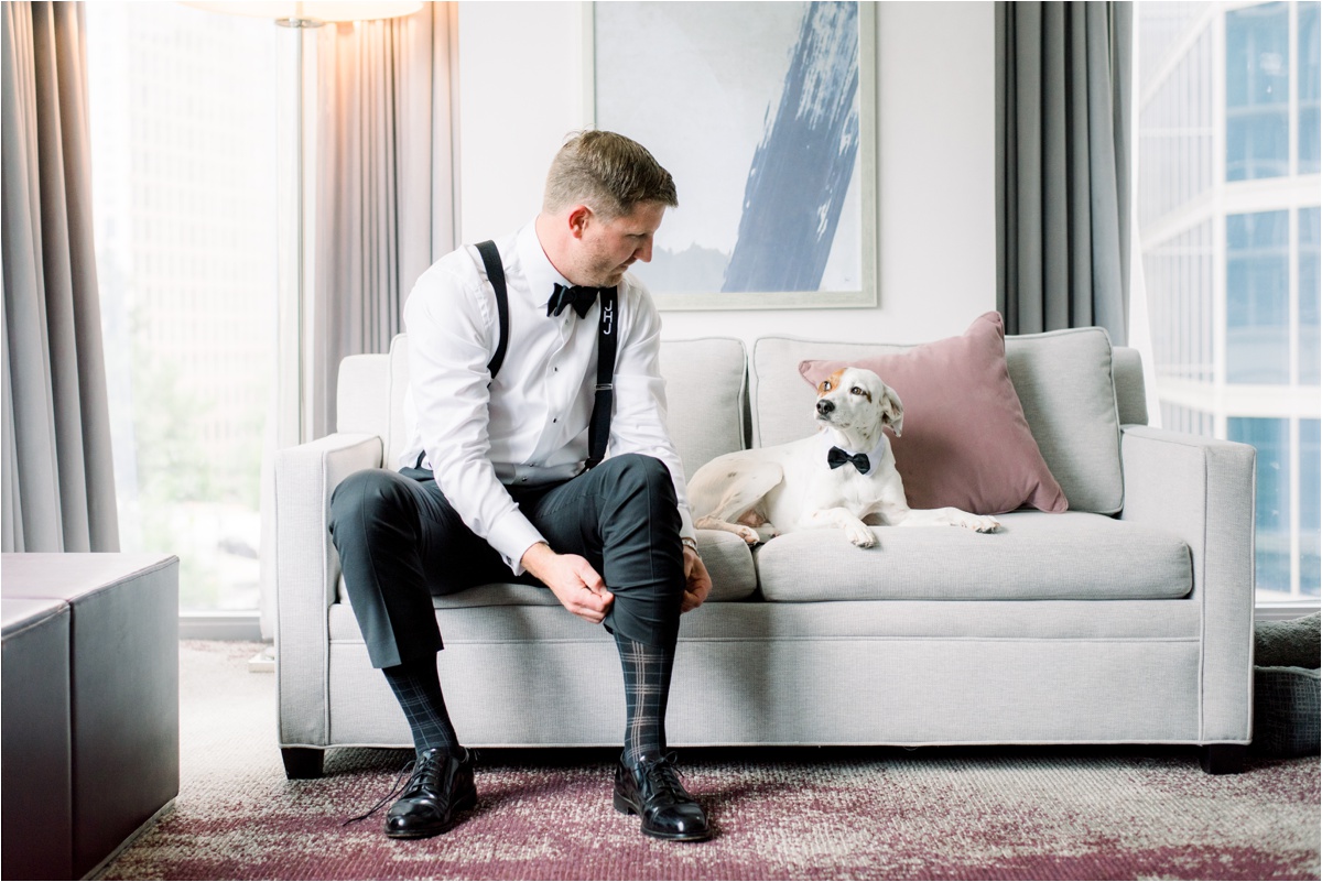 groom getting ready with his dog, dogs at weddings