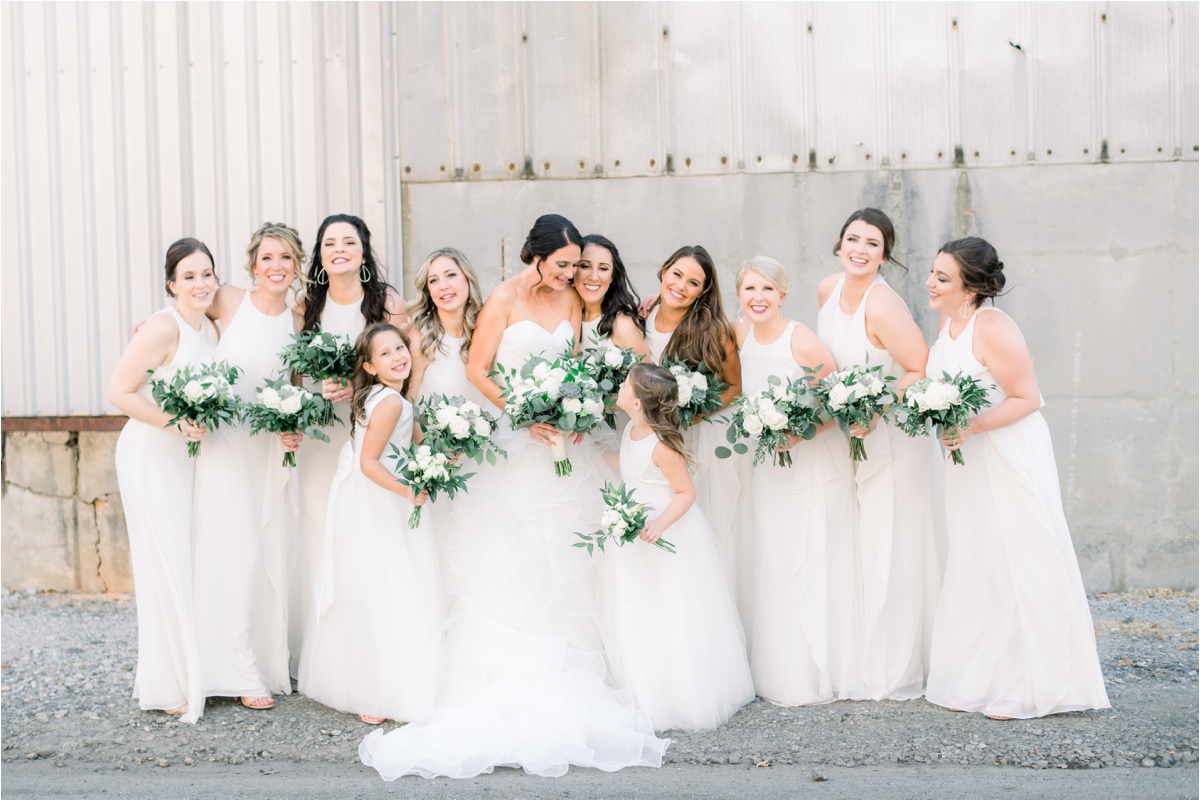 ivory bridesmaids dresses, bridesmaids at the foundry at puritan mill, green and ivory wedding