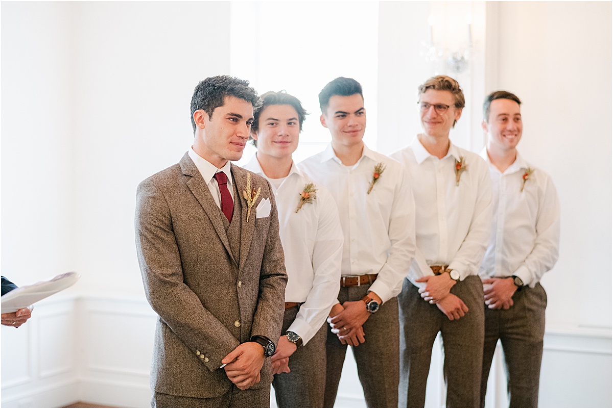 grooms emotional first reaction to seeing his bride walk down the aisle