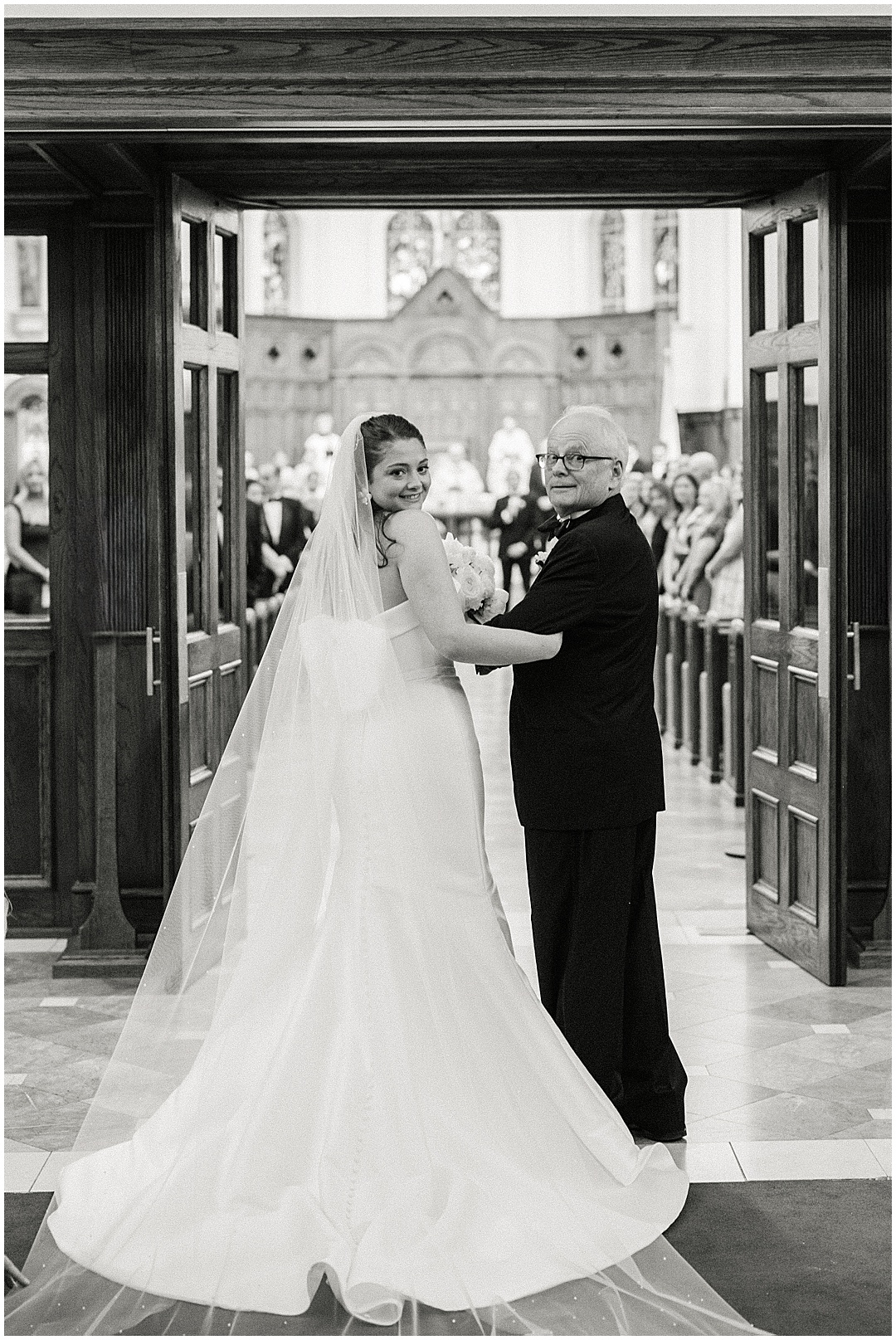 bride and father before walking down the aisle