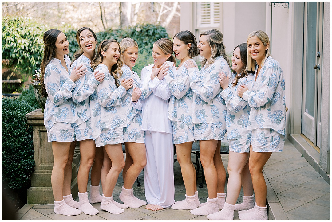 bride and bridesmaids matching blue and white pajamas