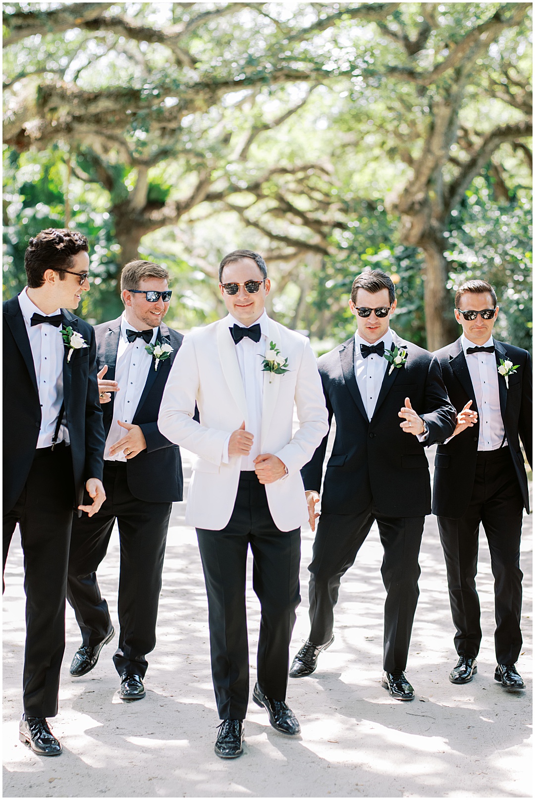 groom and groomsmen in sunglasses