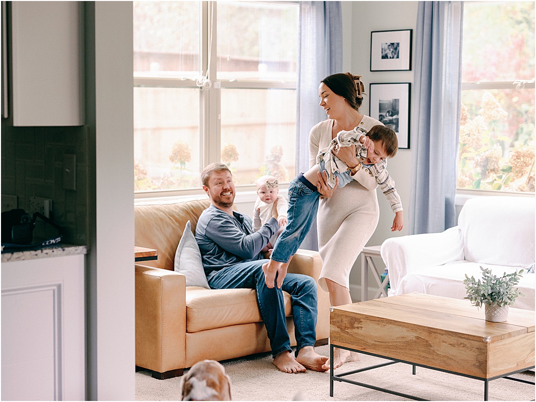 playful family photos in their home