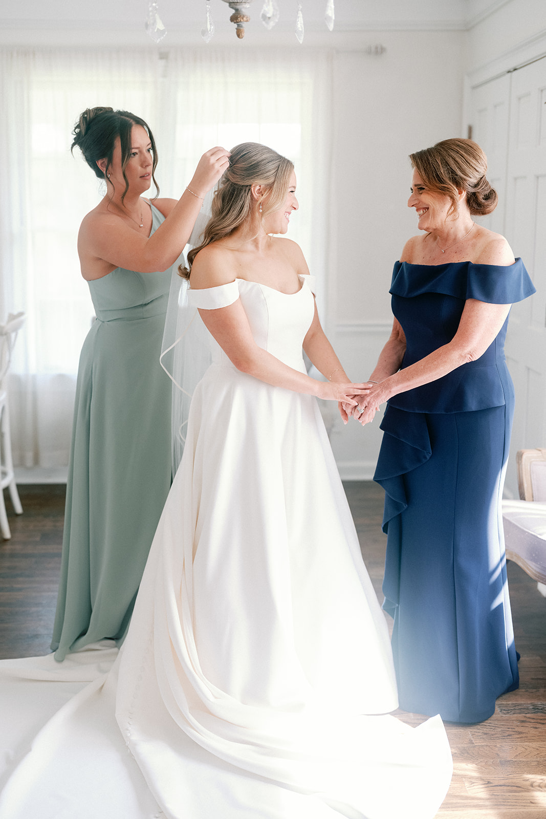Bride Getting Dressed at Little River Farms