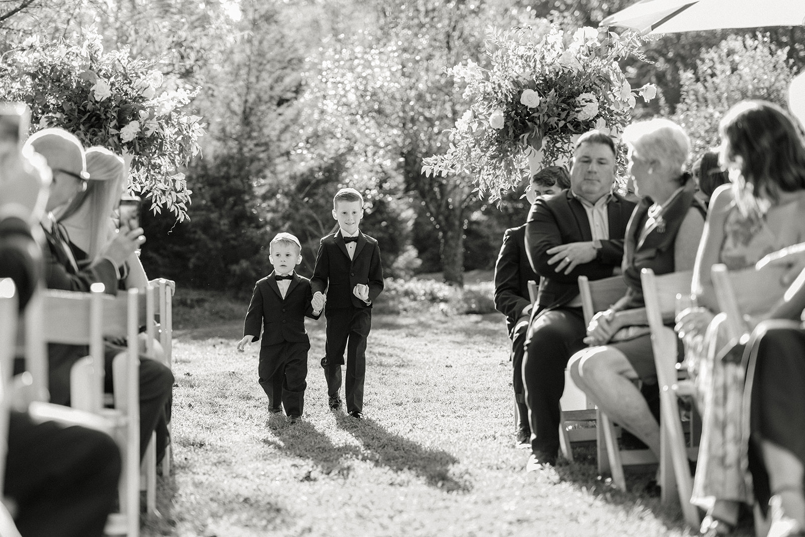 Ring Bearers Walking Down Aisle at Outdoor Wedding