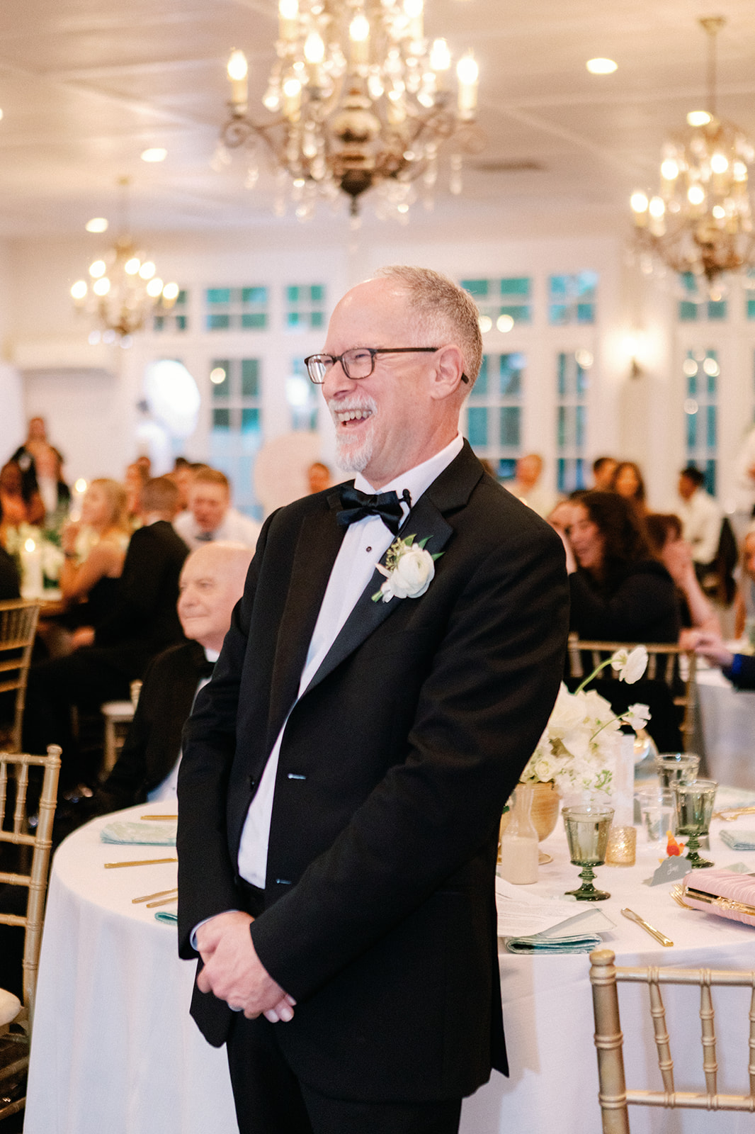 Father of Bride Watching First Dance at Wedding