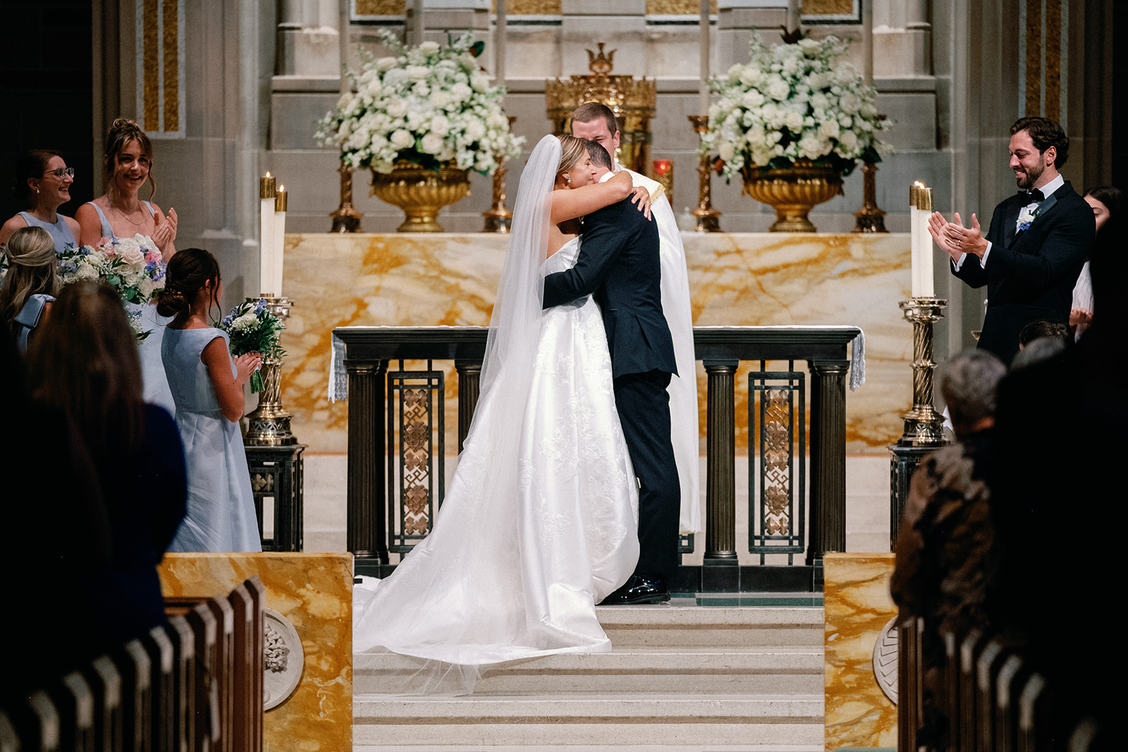 Bride and Groom Hug at Ceremony at Cathedral of Christ the King