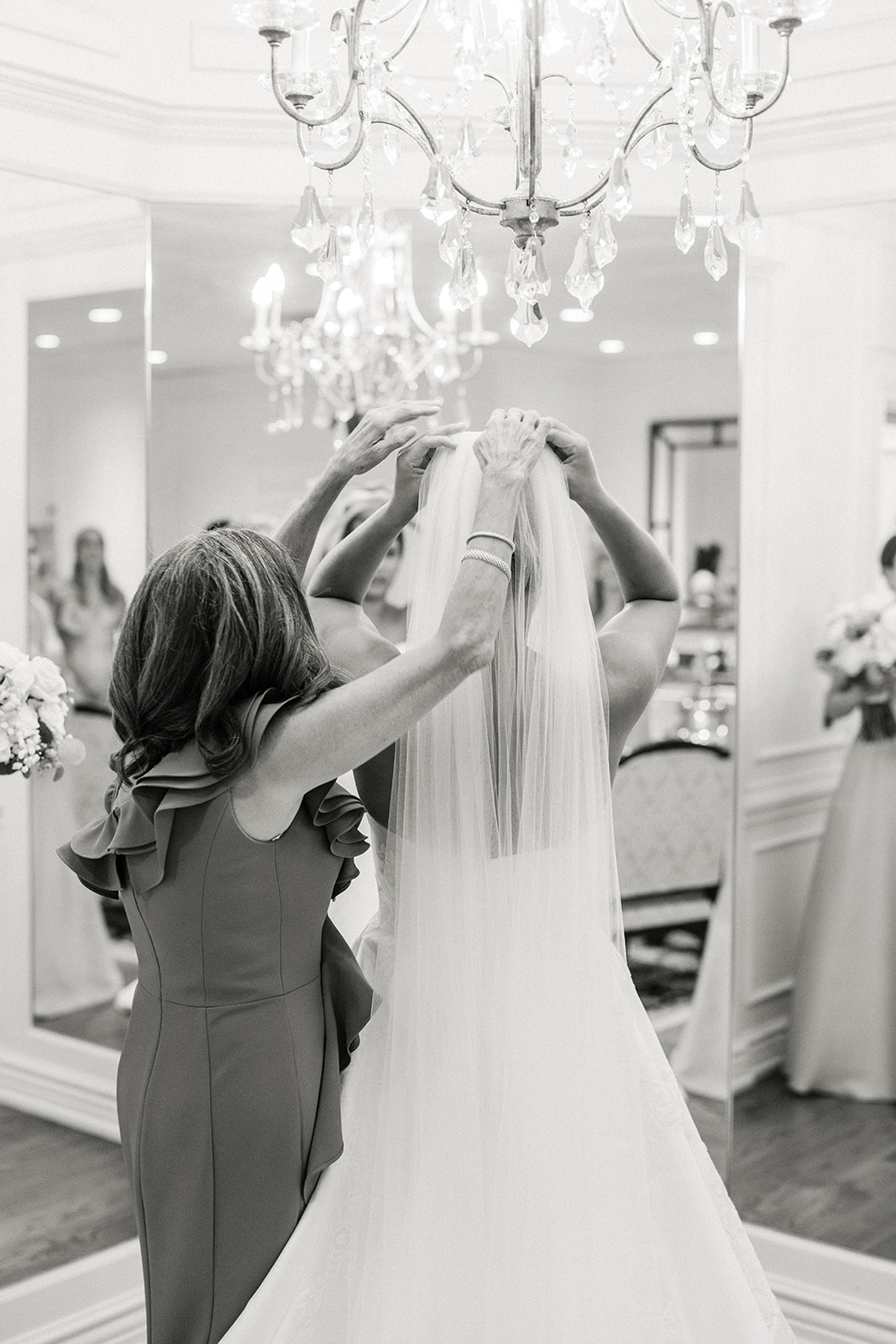 Bride Putting on Veil Before Walking Down Aisle
