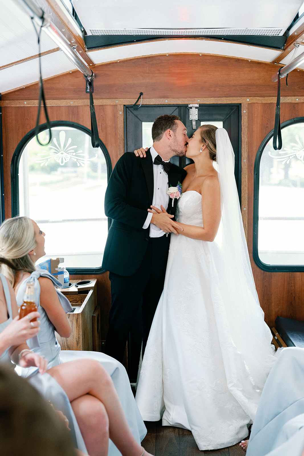 Bride and Groom Kiss on Trolley at Atlanta Wedding