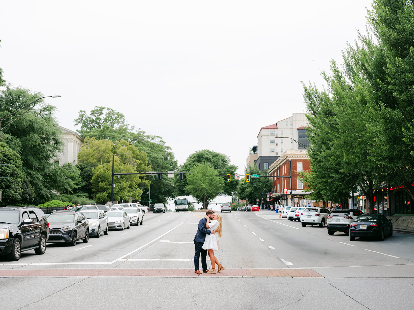 Engagement Photo Locations in Atlanta - 6 Outdoor Spaces for Stunning Photos - engagement photo locations in atlanta Engaged Couple Kiss in Middle of Street, Downtown Atlanta