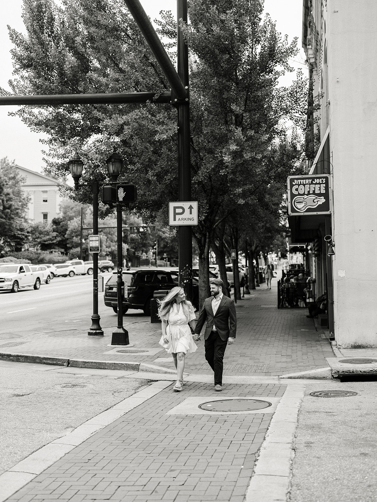 Engagement Photo Locations in Atlanta - 6 Outdoor Spaces for Stunning Photos - engagement photo locations in atlanta Engaged Couple Walk Through Downtown Atlanta Together