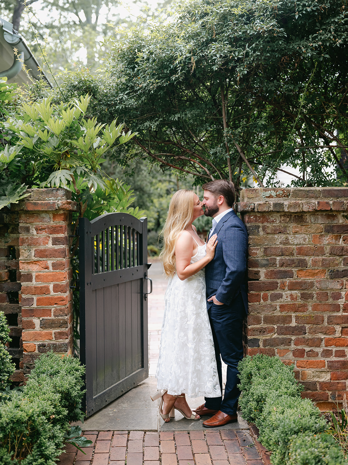 Engagement Photo Locations in Atlanta - 6 Outdoor Spaces for Stunning Photos - engagement photo locations in atlanta Couple Kiss During Engagement Photoshoot in Atlanta Gardens