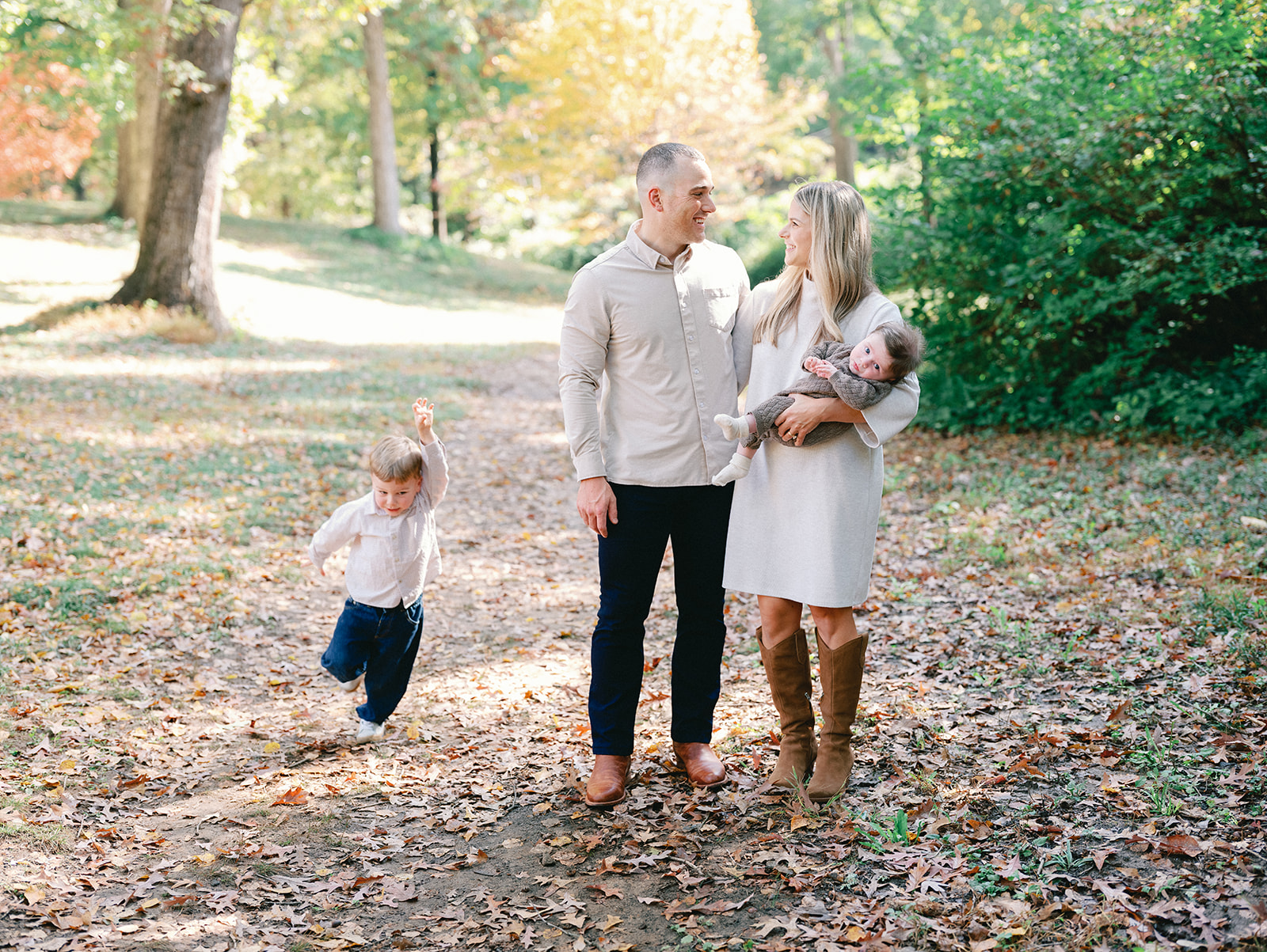 Fall Family Photos Atlanta - Mini Sessions - family photos atlanta Toddler Running Around Parents During Atlanta Family Photoshoot