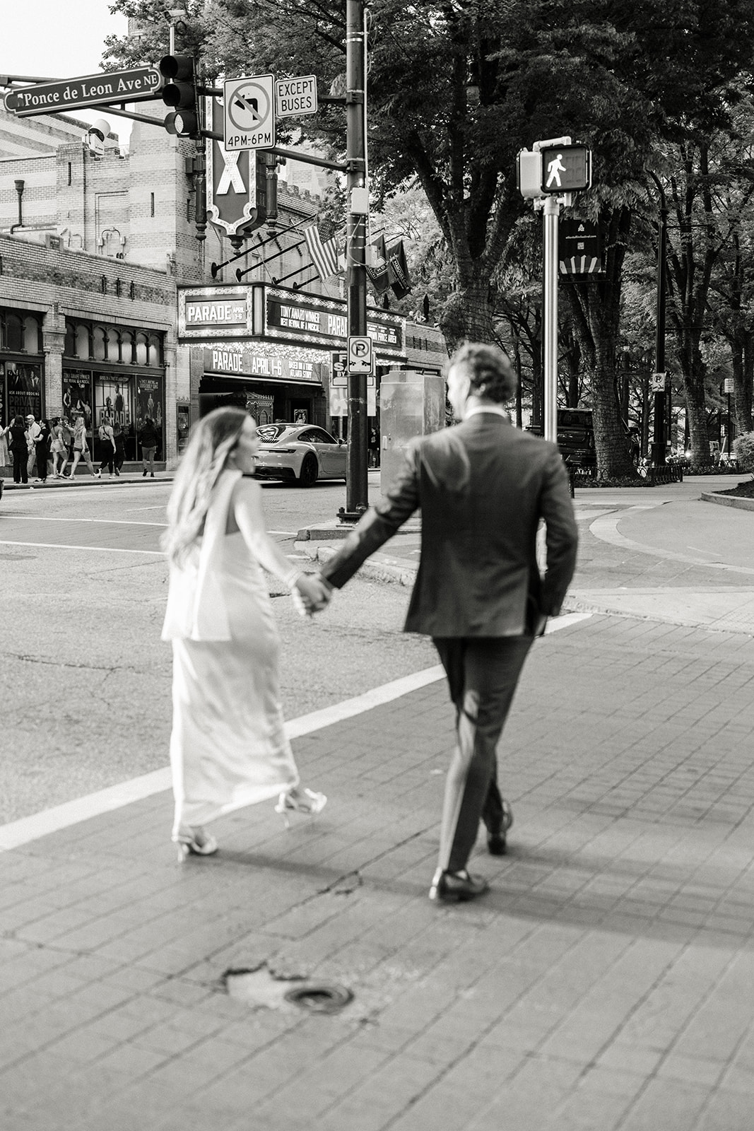Engagement Photo Locations in Atlanta - 6 Outdoor Spaces for Stunning Photos - engagement photo locations in atlanta Engaged Couple Hold Hands, Walk Through Downtown Atlanta During Photoshoot
