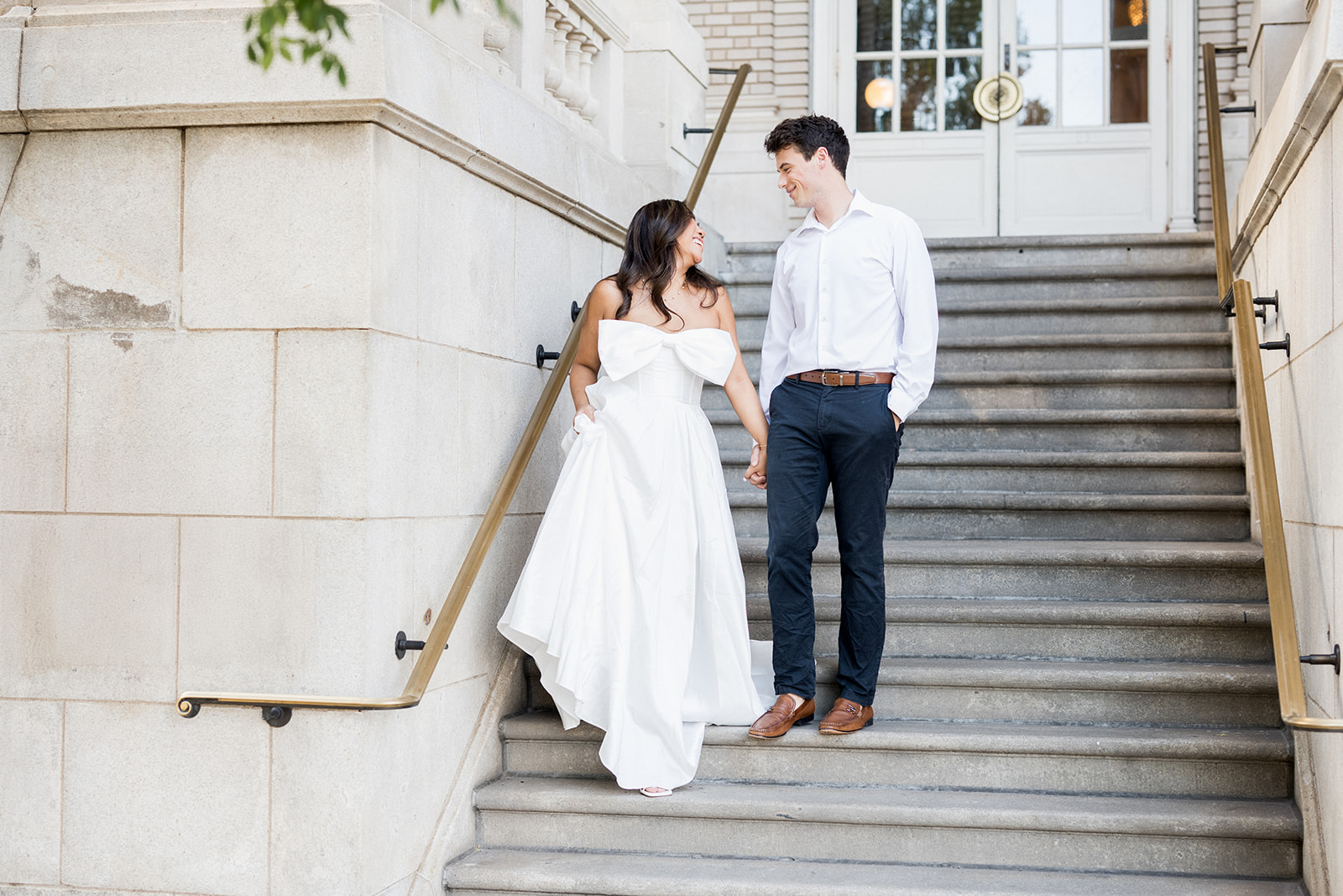 Engagement Photo Locations in Atlanta - 6 Outdoor Spaces for Stunning Photos - engagement photo locations in atlanta Bride and Groom Walk Down Stairway at Georgian Terrace Hotel, Atlanta