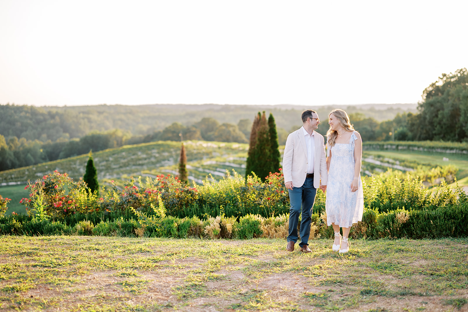Engagement Photo Locations in Atlanta - 6 Outdoor Spaces for Stunning Photos - engagement photo locations in atlanta Beautiful Backdrop of Rolling Vineyards with Engaged Couple, Montaluce Winery