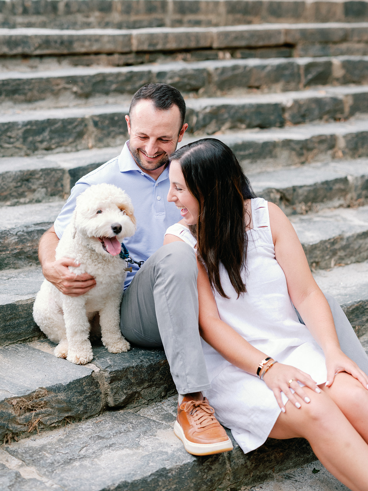 Engagement Photo Locations in Atlanta - 6 Outdoor Spaces for Stunning Photos - engagement photo locations in atlanta Engaged Couple Sits on Stone Stairs with Dog at Piedmont Park